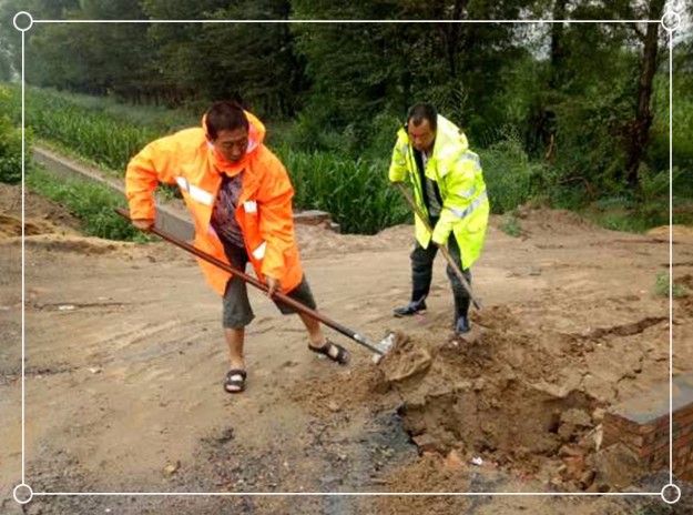 雨中的养路人3.jpg